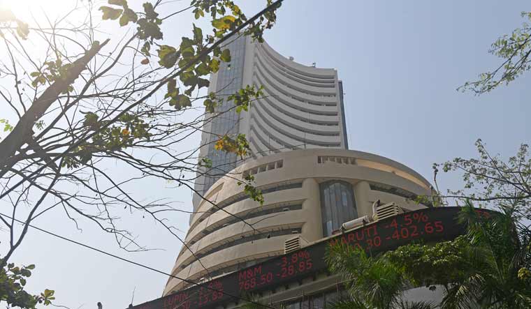 Sensex, Nifty settle slightly lower after setting record highs; analysts advise caution on mid and small caps - Vimarsana News