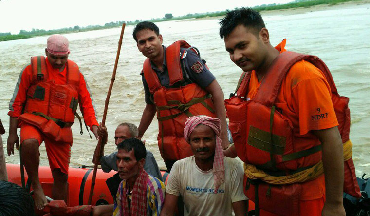 Ndrf While Rescuing NDRF prepositions rescue, relief teams in flood-prone states- The Week