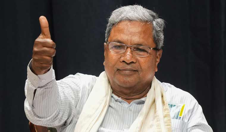 Karnataka govt's 'Anna Bhagya' and 'Gruha Jyothi' guarantees come into effect from Saturday - Vimarsana News