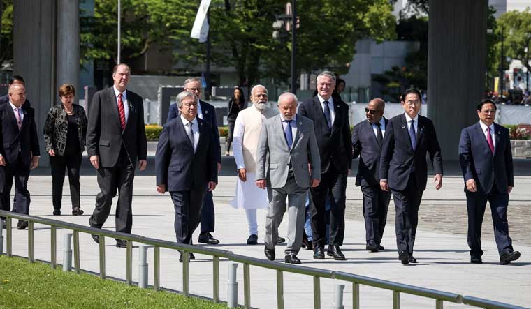 G7 Summit: PM Modi pays tribute at Hiroshima Memorial Park; Quad's veiled dig at China - Vimarsana News
