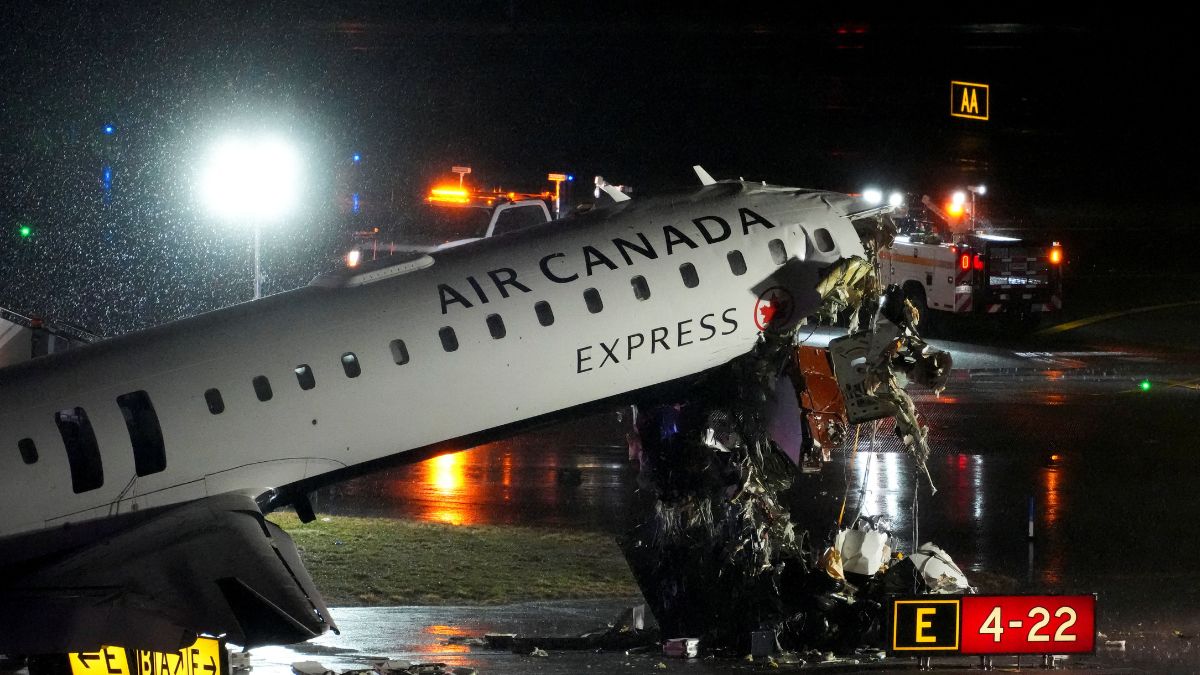 Both pilots dead after Air Canada Express plane collides with truck at New York's LaGuardia Airport